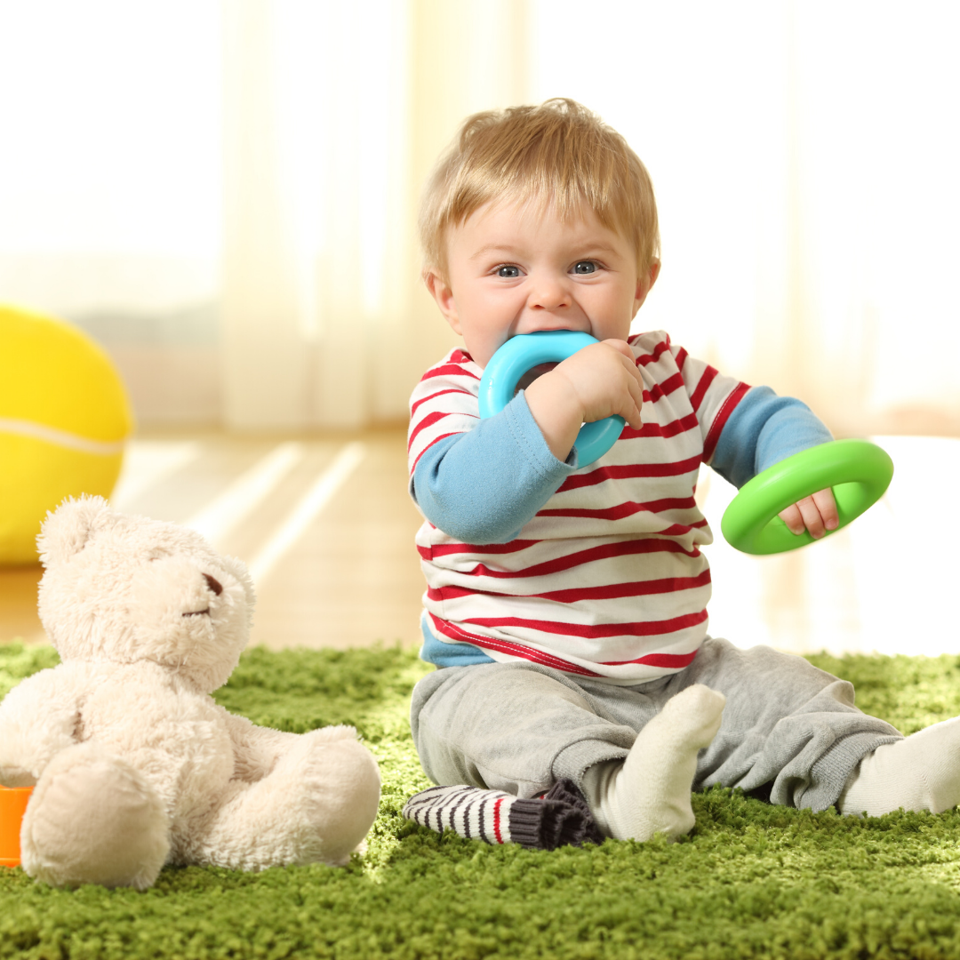 Why do babies put objects in their mouths, and does mouthing play a part in speech development?